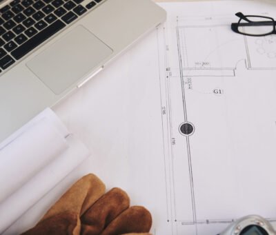 Close-up image of blueprint on table of architect